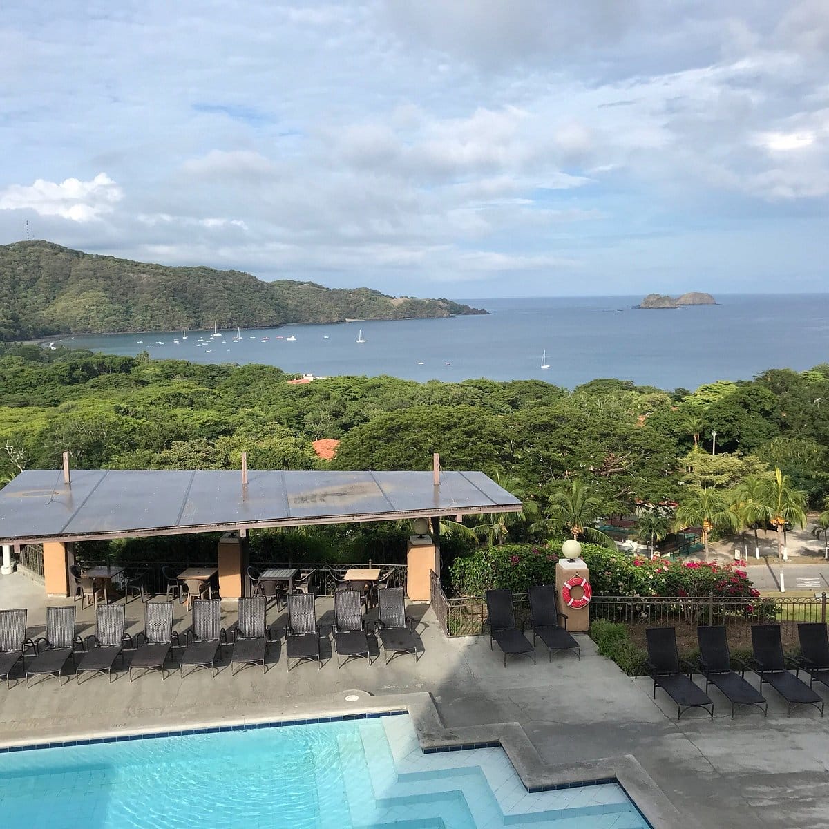 Villas Sol Hotel And Beach Resort pool trees